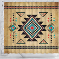 Tan shower curtain with bold black starburst behind central multicolor diamond medallion