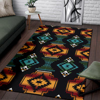 Black rug with teal, green, yellow, and red Native geometric blocks and arrows