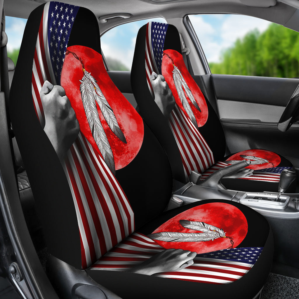 Front and rear seat covers showing red feather emblem with American flag stripe print