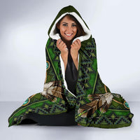 Green hooded blanket with white-lined hood and Native mandala print in turquoise and gold