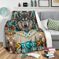 Wolf motif blanket with turquoise circles, beadwork arrows, and decorative feather fringe