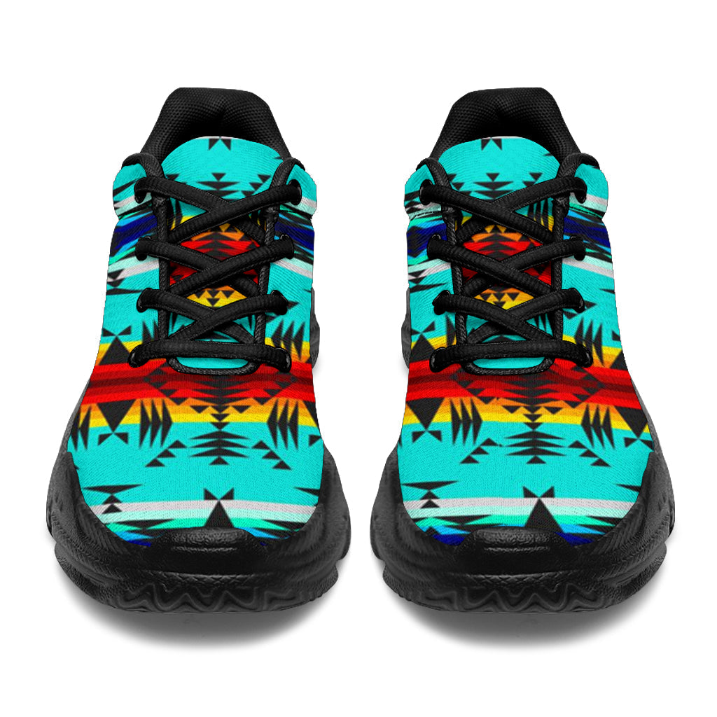 Turquoise Native American patterned chunky sneakers, black laces, rear view