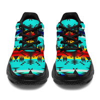 Turquoise Native American patterned chunky sneakers, black laces, rear view