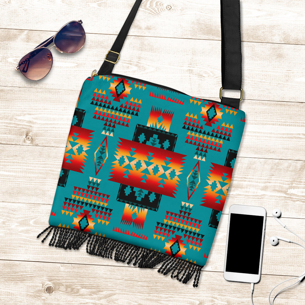 Flat view crossbody bag: turquoise multi-pattern, black fringe, adjustable strap