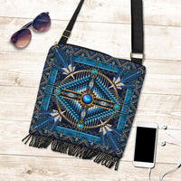 Blue beaded mandala crossbody bag with fringe, black strap and gold buckle (flat lay)