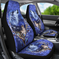 Car interior with front seat cover set: blue wolf scene on headrests and seat cushion