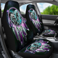 Front seat covers featuring skull dreamcatcher graphic in teal, purple, and green on black