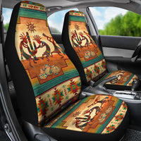 Kokopelli totem car seat covers in multicolor on front seats and center console