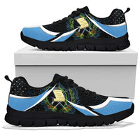 Black sneakers with blue side panels, white stripe details, black rugged outsole