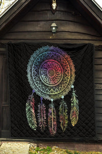 Black quilt with multicolor mandala dreamcatcher, feather cluster graphic on diamond stitching