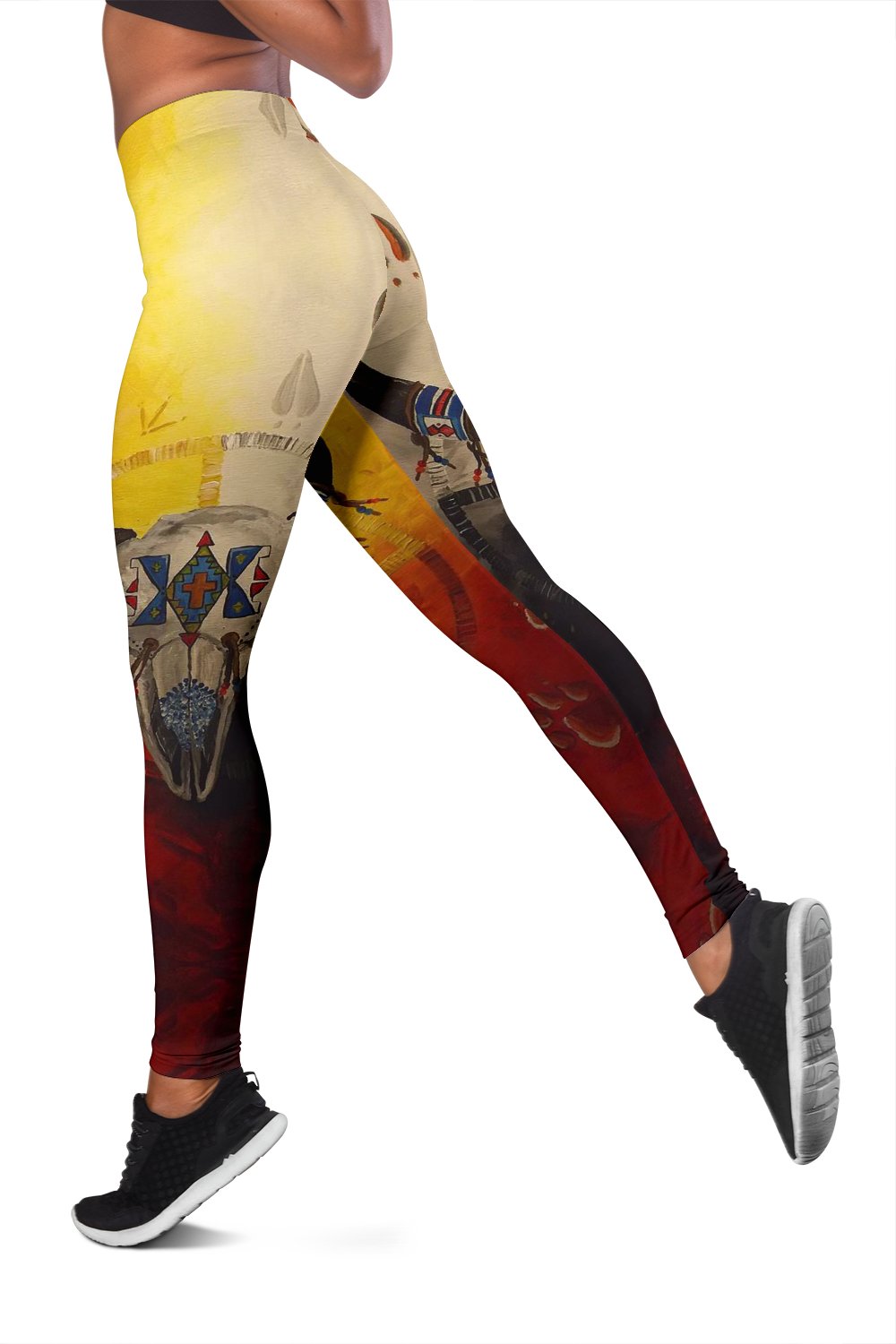 Multicolor leggings detail: bison head and wheel motifs, yellow/beige and red