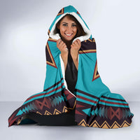 Hooded blanket with white faux-fur trim around hood, multicolor tribal design
