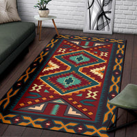 Multicolor tribal geometric area rug with repeating border and central cross-star motifs.