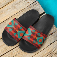 Pair of red geometric slide sandals with black footbed and green and teal straps