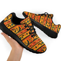 Pair of native motif sport sneakers with black laces and cushioned sole, angled view