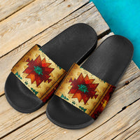 Pair of black slide sandals with center Southwest native symbol graphic strap