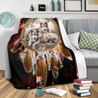Red and dark galaxy wolf blanket featuring dreamcatcher center and feathered charm details