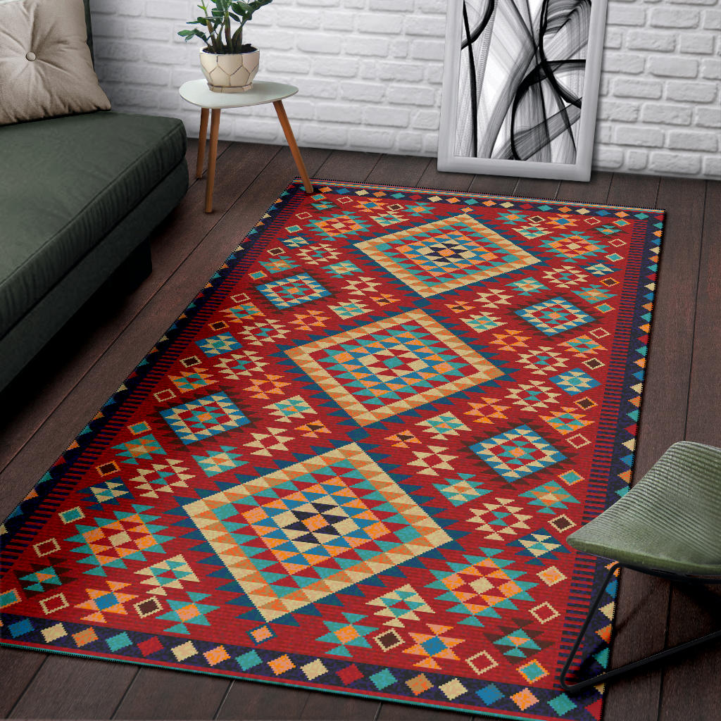 Colorful geometric area rug featuring diagonal diamonds on a dark red base