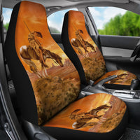 Multicolor warrior-on-horseback car seat covers installed on front seats, black edges