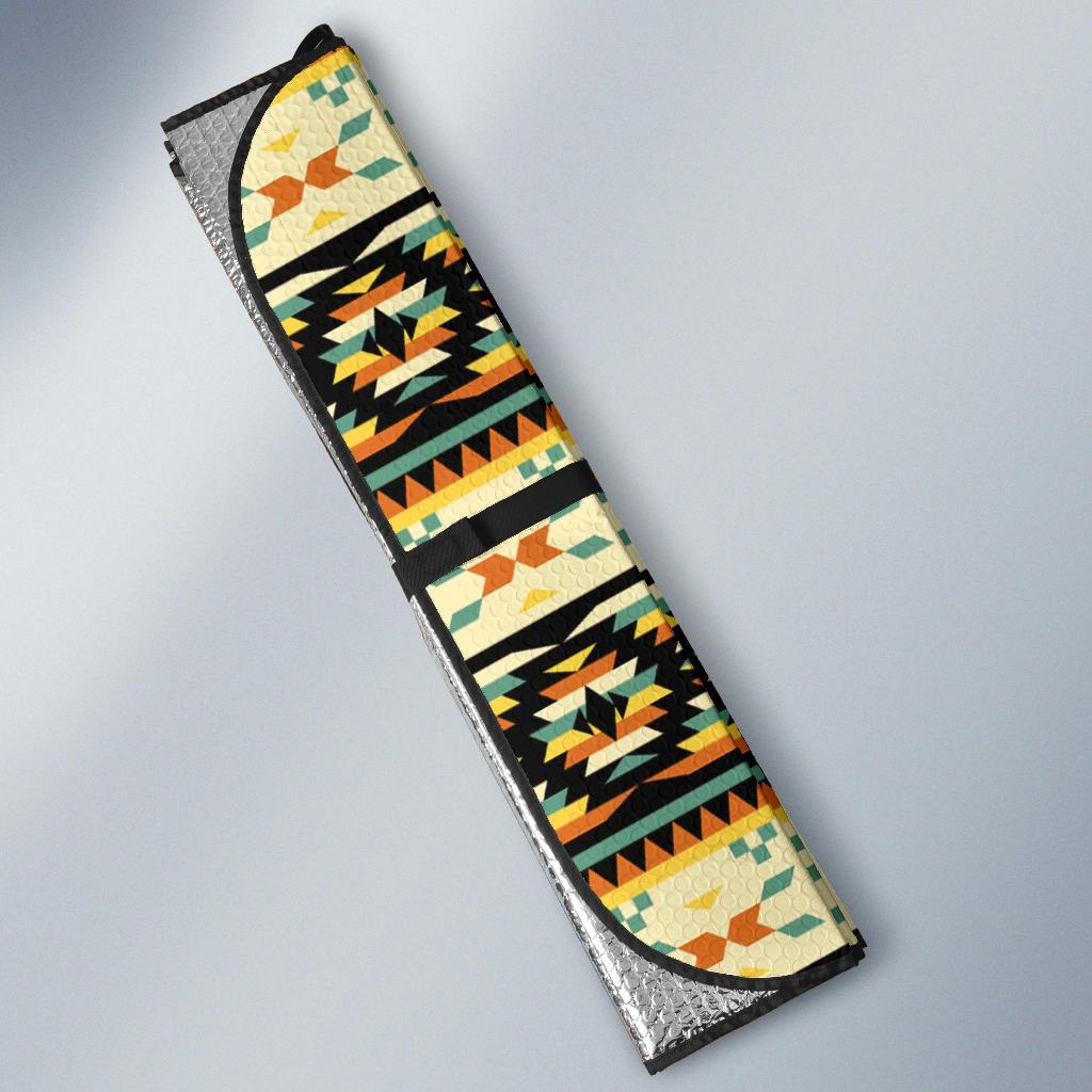 Folded car sun shade with silver reflective backing, colorful geometric Native-style print