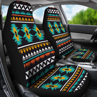 Geometric multicolor seat cover pair on front seats, black background with zigzag motifs