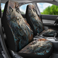 Pair of car seat covers with wolf artwork and matching printed seat cushions
