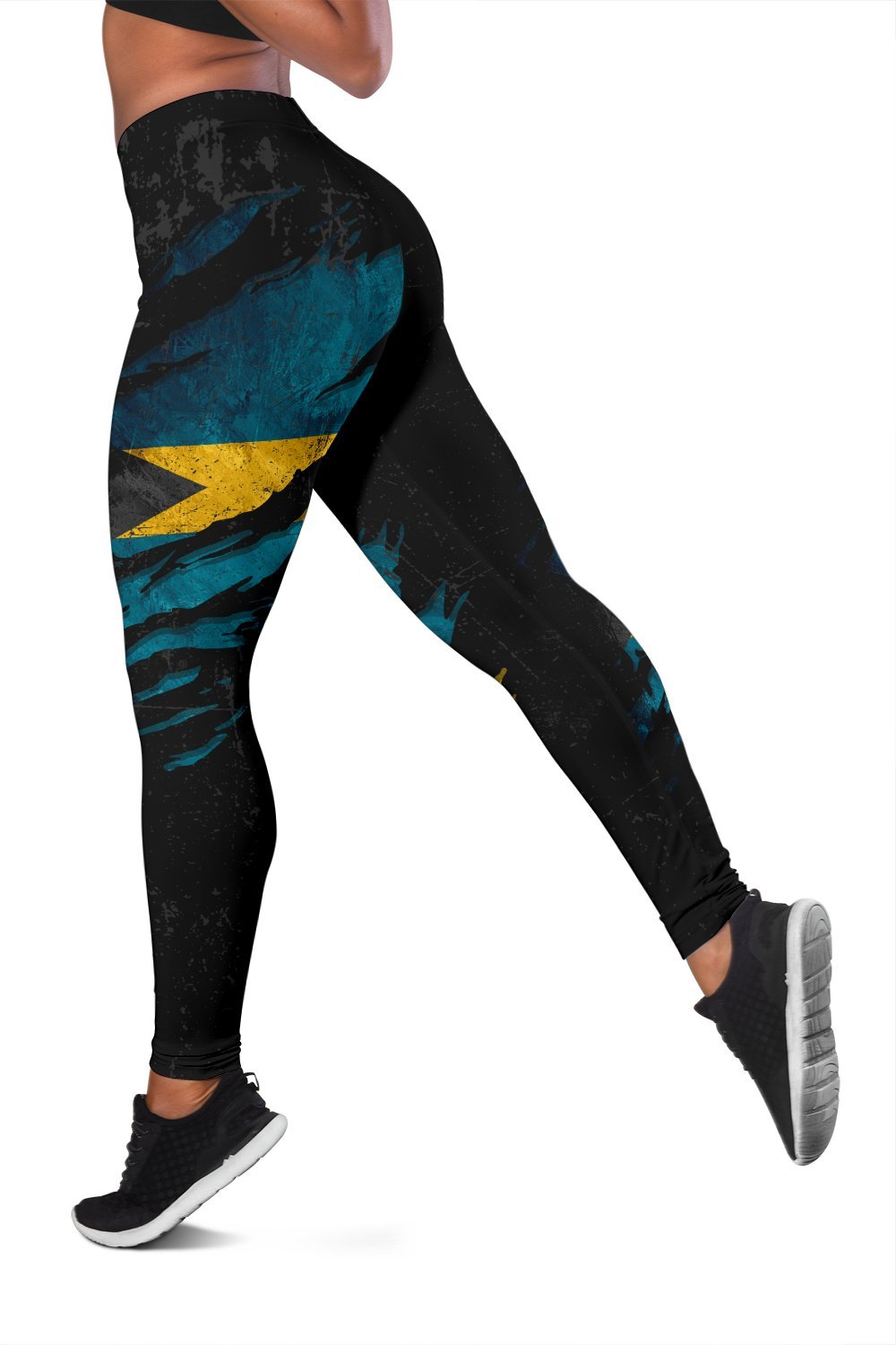 Women's black leggings with teal and yellow grunge-style tropical graphic, full length