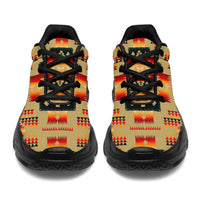 Light brown chunky sneakers, back view with Native pattern and black heel panel