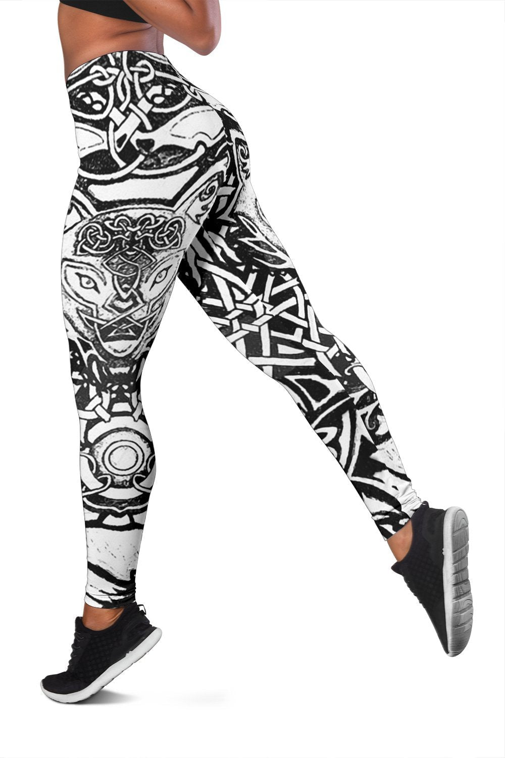 Black and gray leggings with bold Viking wolf tattoo graphic, full-length sleeves on legs