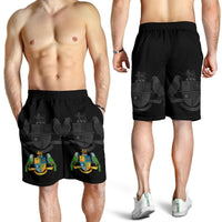 Black Dominica shorts with elastic waistband and crest-bird print, worn by model