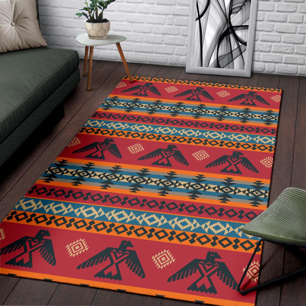 Red patterned area rug with blue and orange stripe bands and repeating animal icons