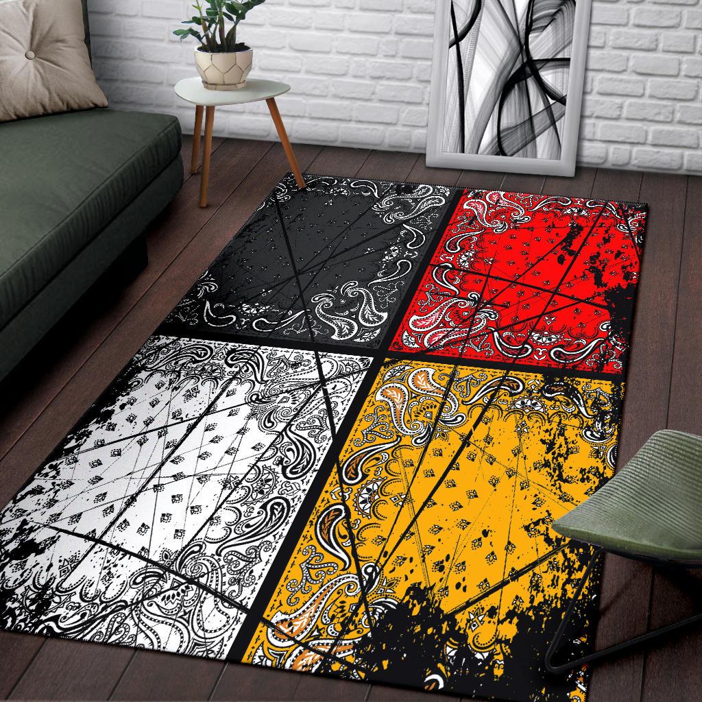 Area rug with black, red, yellow, and white bandana-style patchwork squares