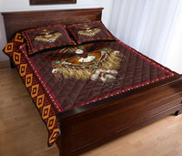 Dreamcatcher quilt bed set featuring large center graphic, burgundy fabric, two matching pillows