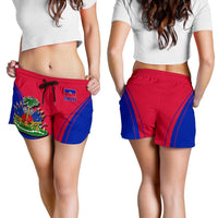 Women’s red and blue Haiti shorts with elastic waistband, black drawstring, front print