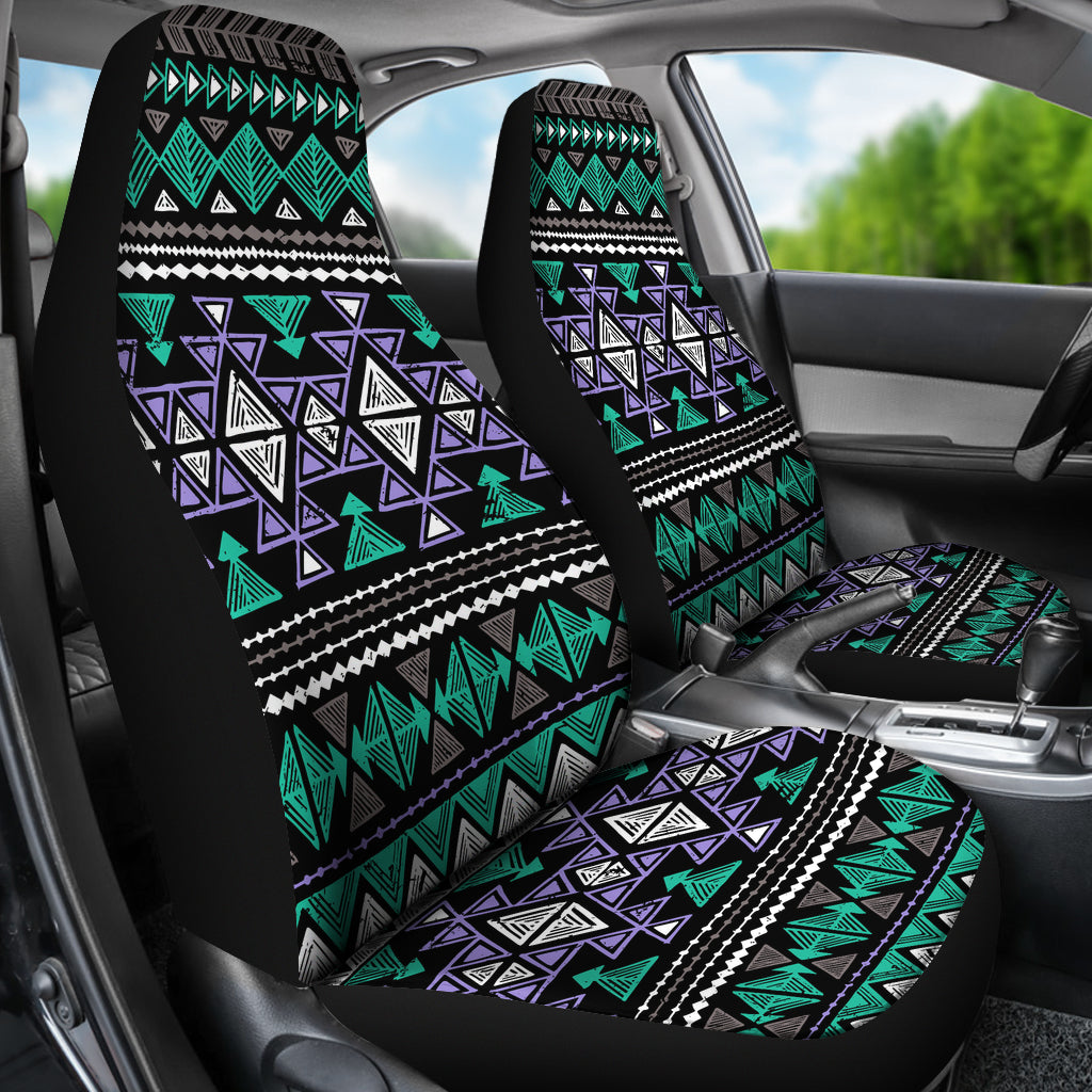 Car seat cover set with neon tribal print on headrests and seat panels, teal and purple