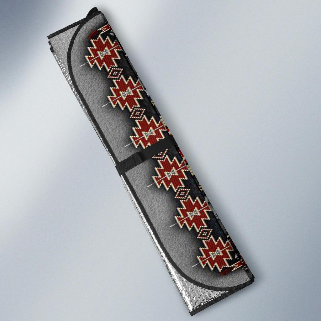Multicolor sun shade side view: gray fabric with red and white geometric trim