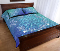Blue and teal quilt with large turtle-mandala medallion, diamond quilting, 2 matching pillows