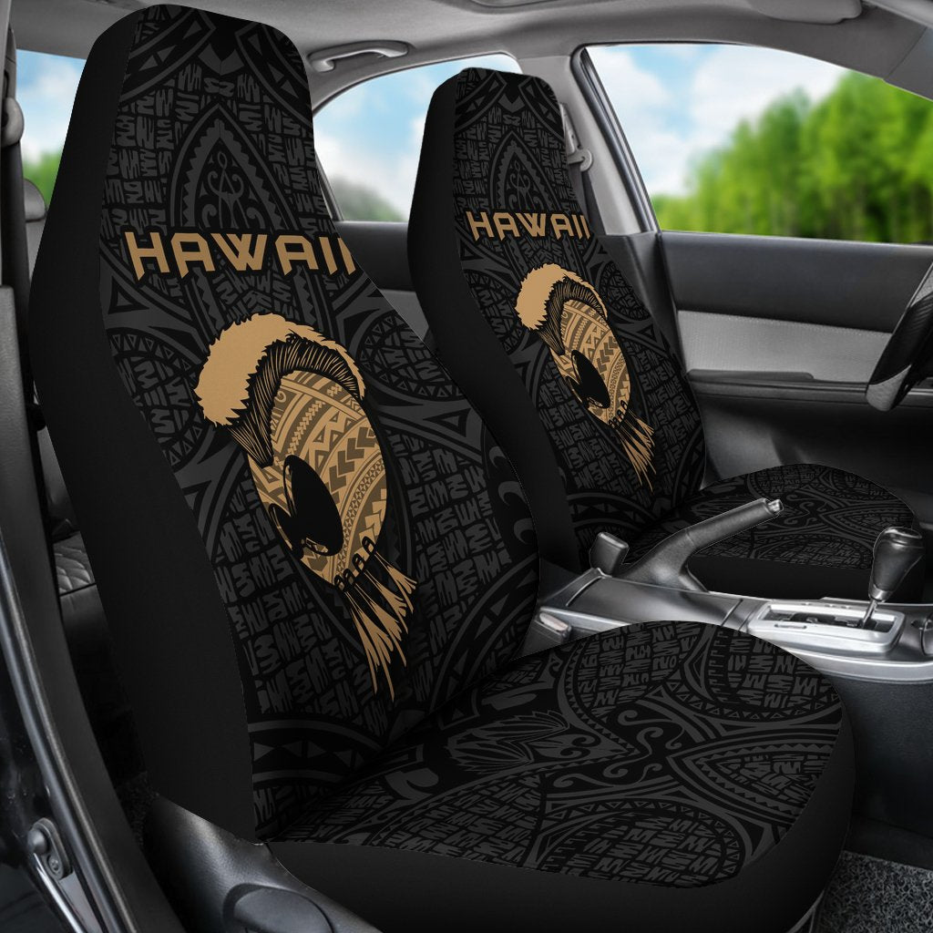 Black installed car seat covers with Hawaii wordmark and warrior helmet on backrests.