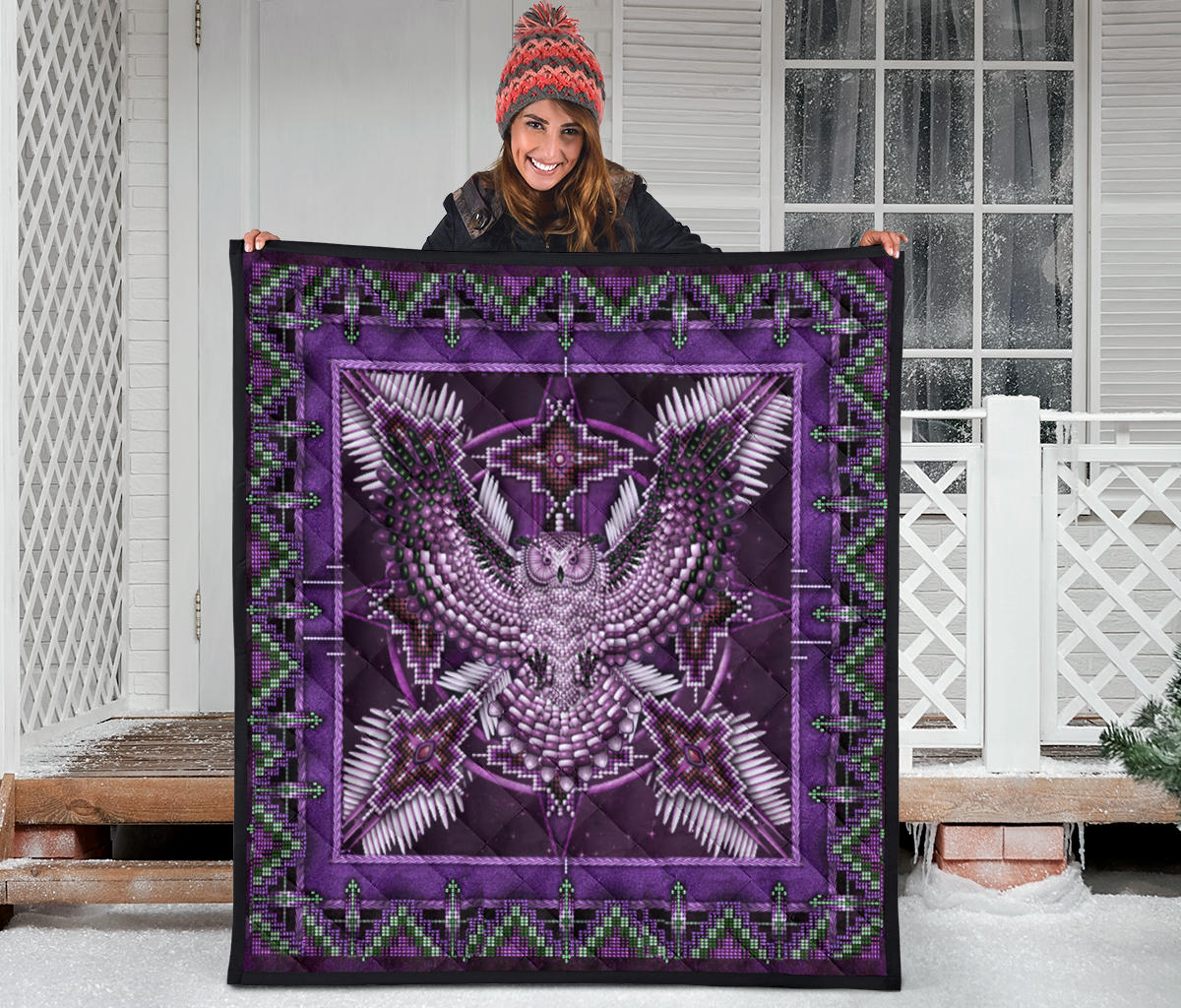 Purple Native American pattern quilt draped flat, featuring central owl/eagle-style mandala