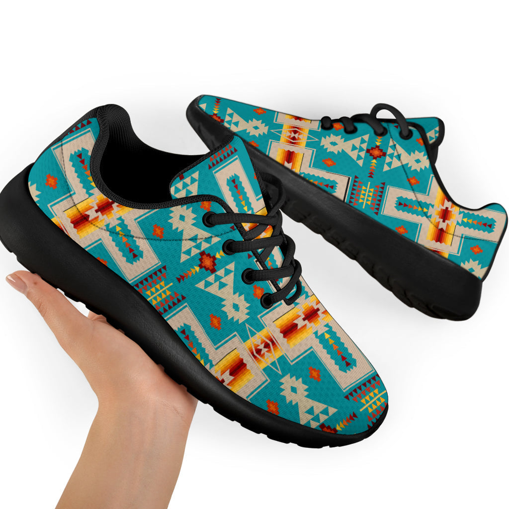 Turquoise tribal sport sneakers, black laces, rubber sole, close-up pair