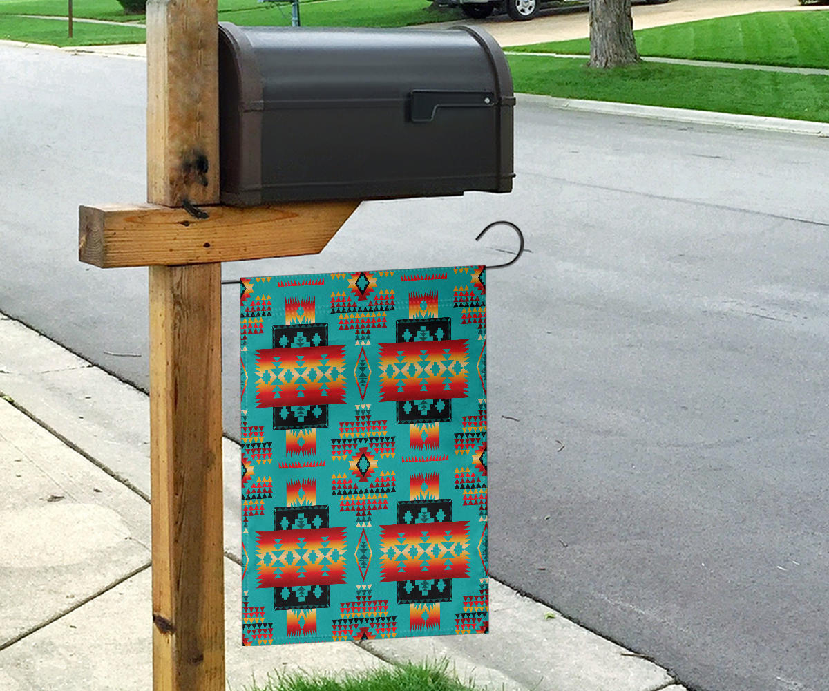 Multicolor Native geometric pattern flag on post, teal background with orange and red stripes