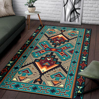 Large geometric area rug in teal, orange, and tan with tribal border design