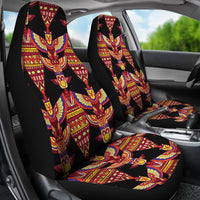 Front car seat covers featuring tall central bird figure and multicolor geometric bands
