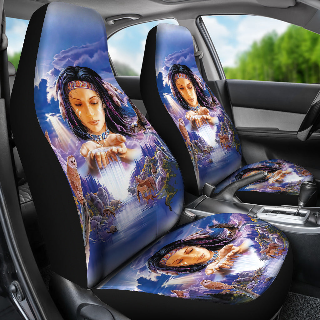 Installed girl-and-animals car seat covers, blue fantasy print on front seats and headrests