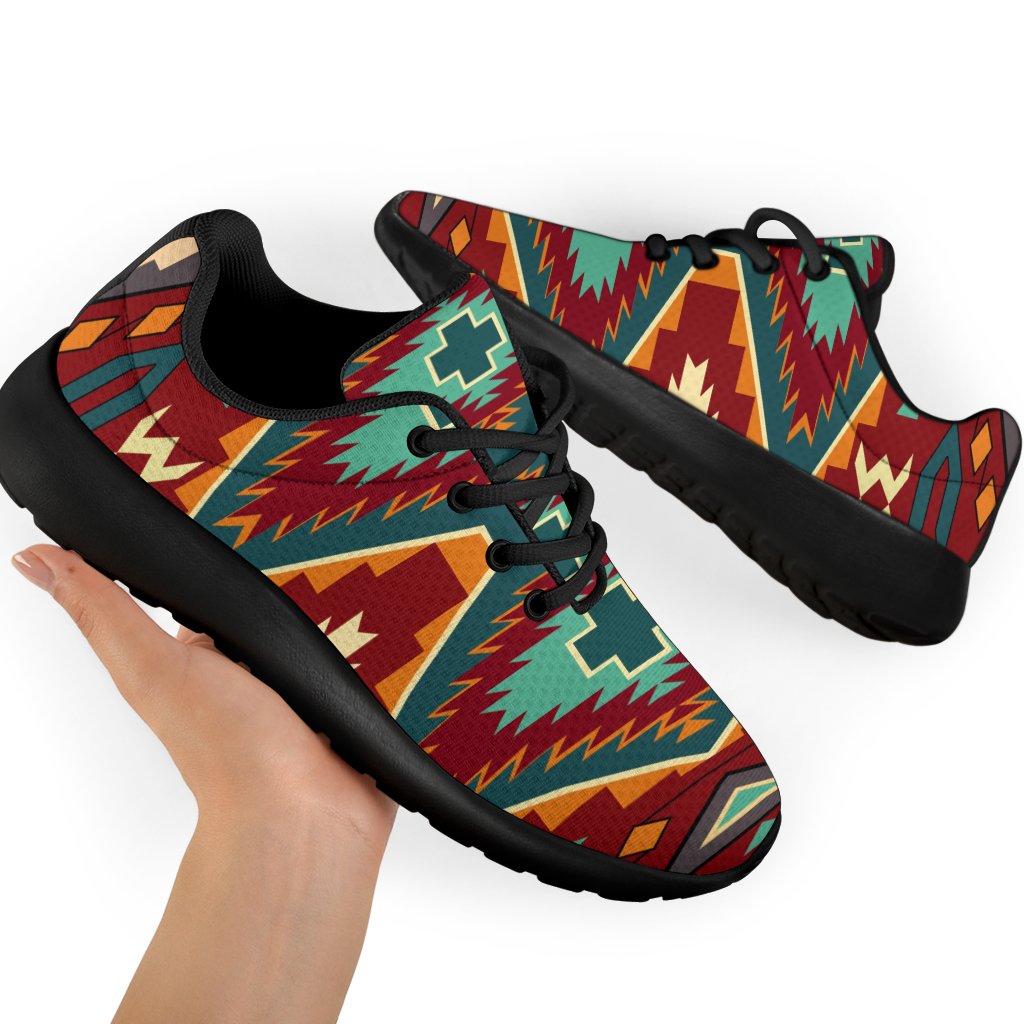 Pair of multicolor tribal-print sport sneakers with black laces and thick black sole