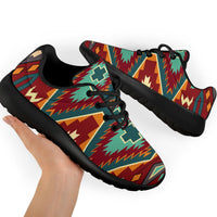 Pair of multicolor tribal-print sport sneakers with black laces and thick black sole