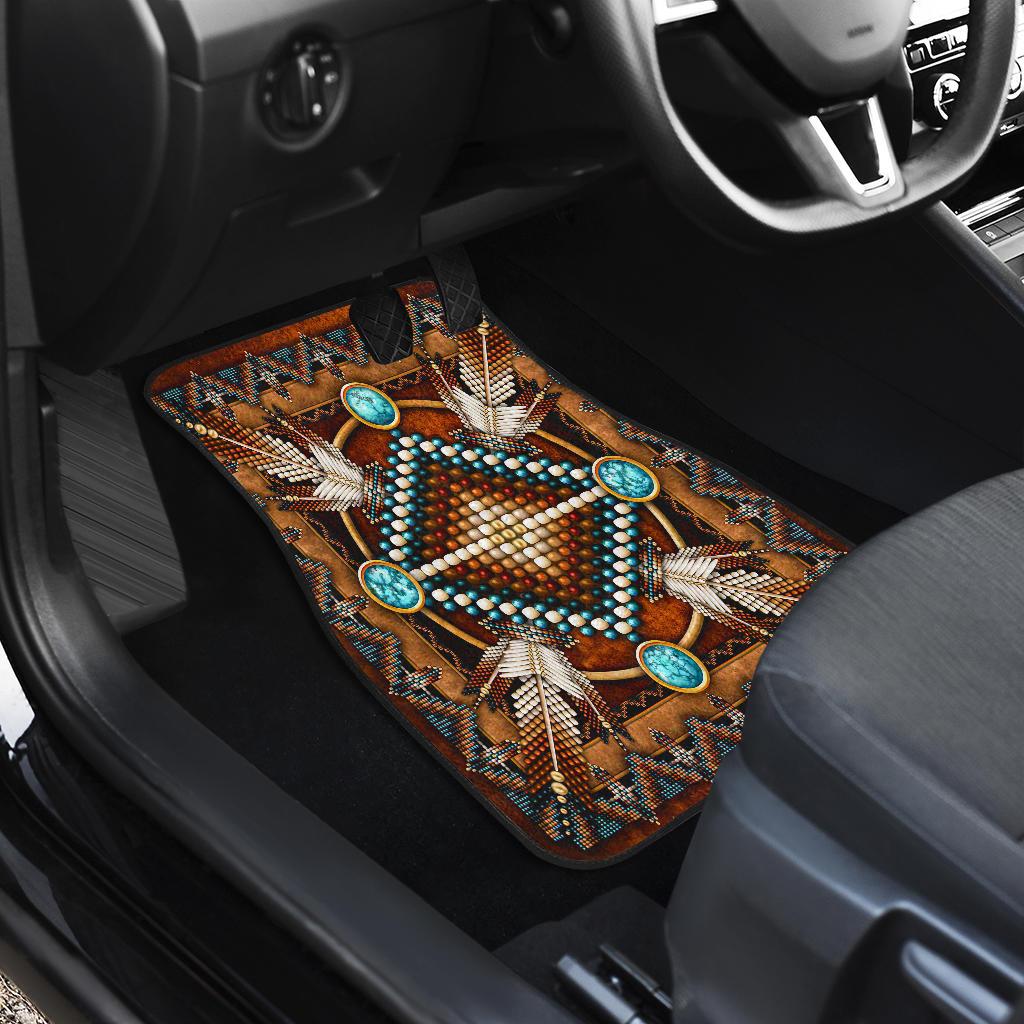 Front car mat close-up: brown Native mandala with turquoise oval stones and bead dots