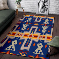 Native-style geometric area rug in navy blue with white and orange-red motifs