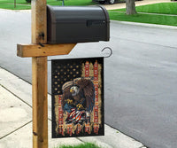 Garden flag decor featuring multicolor bald eagle with stars, ribbons, and red columns