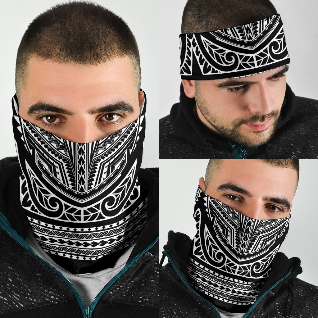 Black-and-white tribal bandana worn by man; nose and chin covered